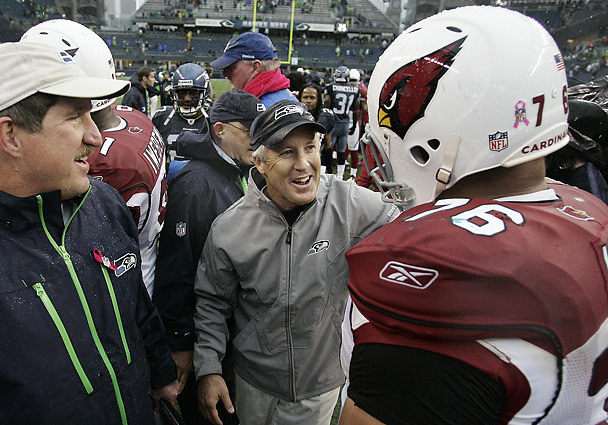 Pete greets former USC player Lutui after game.jpg